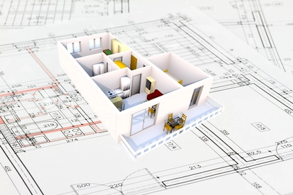 Immagine che rappresenta un edificio in 3D su un progetto cartaceo di un geometra